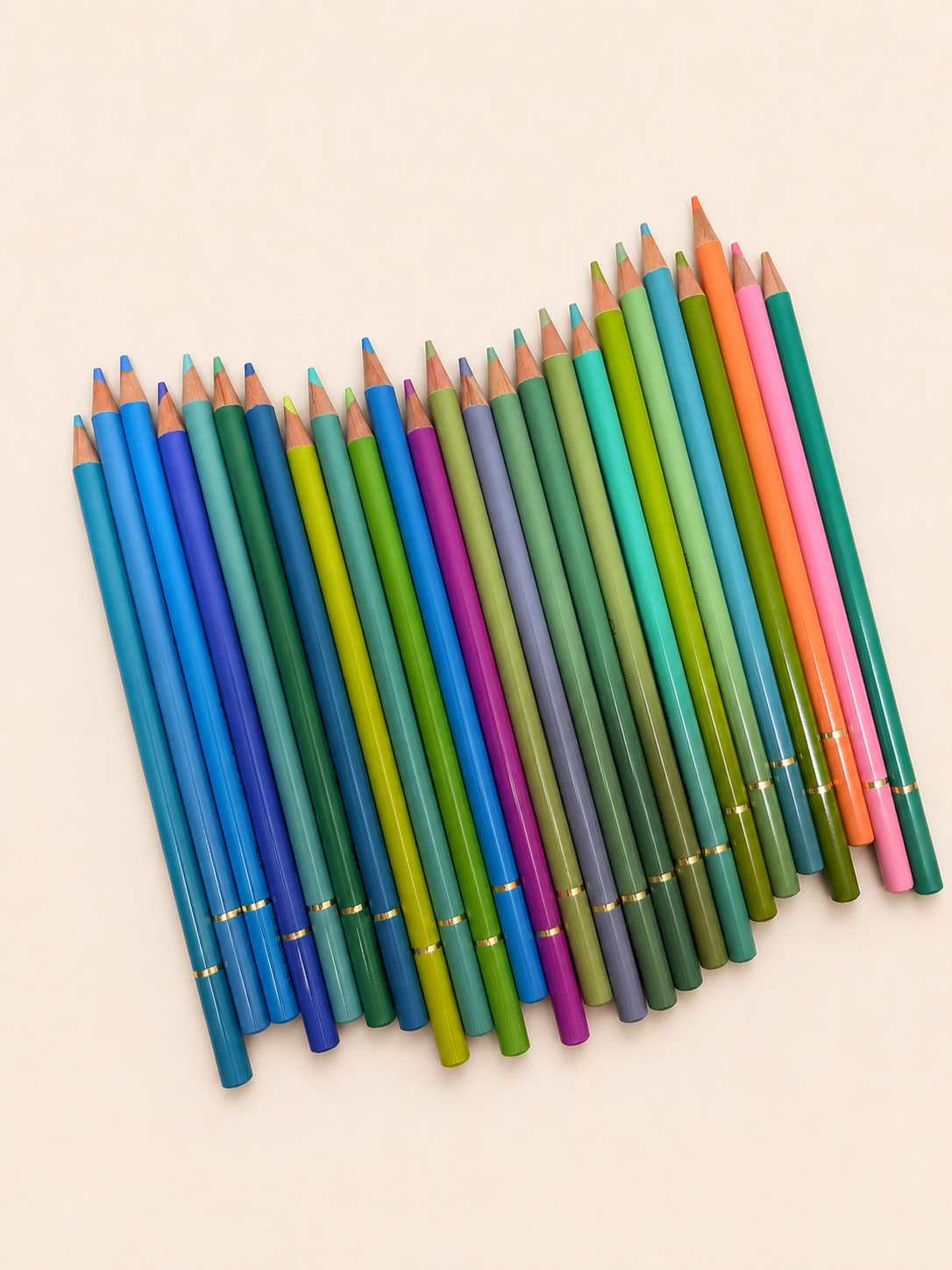 Blue and green coloured pencils fanned out, included in the Zeyrem grief care package