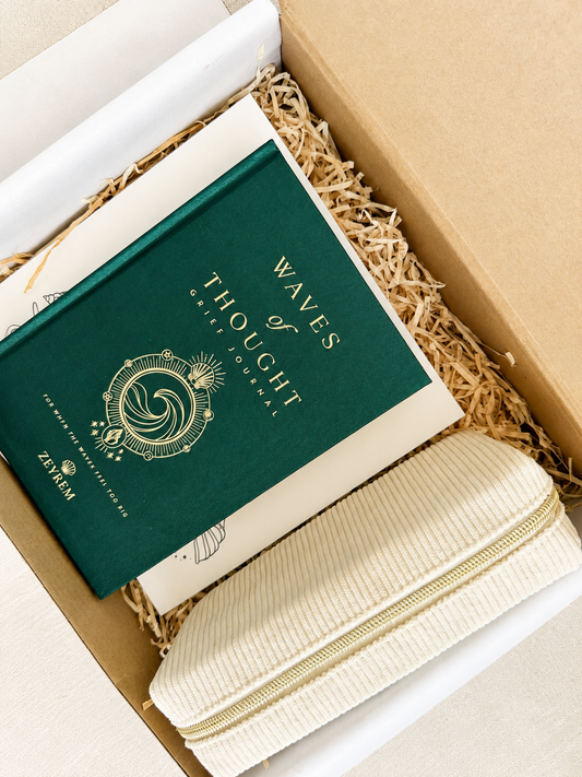 Grief care package packed in a Zeyrem box with the Waves of Thought journal, Still Afloat colouring book and a corduroy pencil pouch, what to send instead of flowers